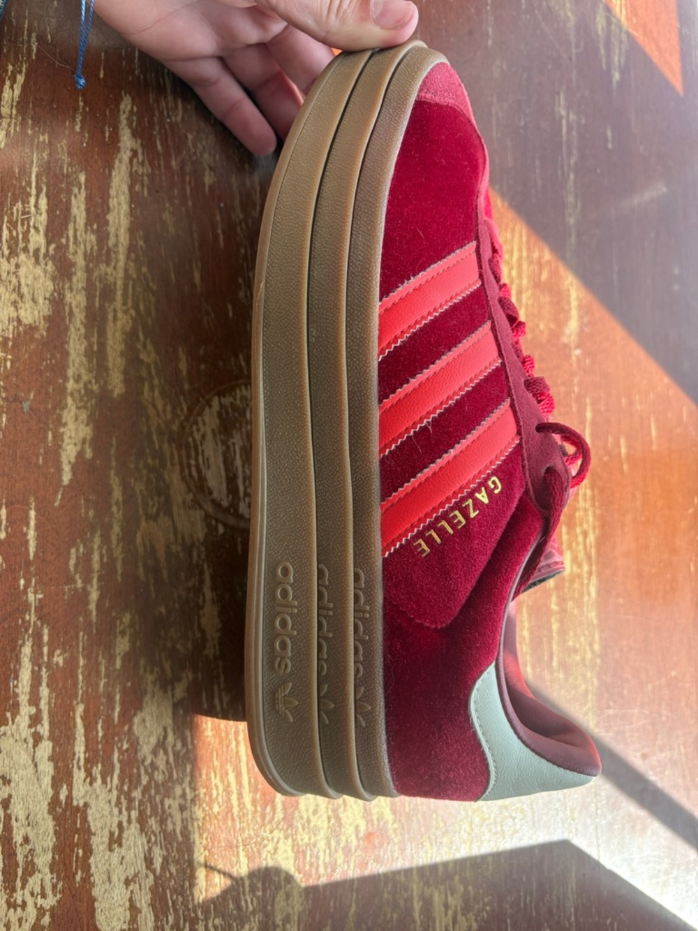adidas women’s  Gazelle Sneakers in Red with Gum Sole